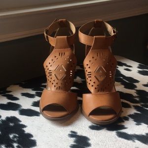 Tan designed wedges, never worn. Size 7
